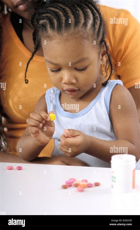 Child Taking Medication Stock Photo Alamy