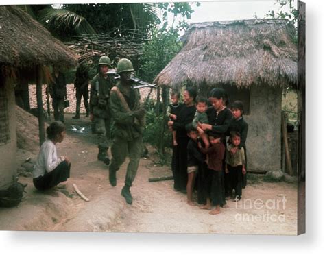 Us Soldiers Enter Vietnamese Village Acrylic Print By Bettmann