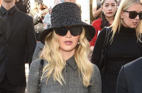 Jennifer Lawrence Flashes Engagement Ring At The Dior Show