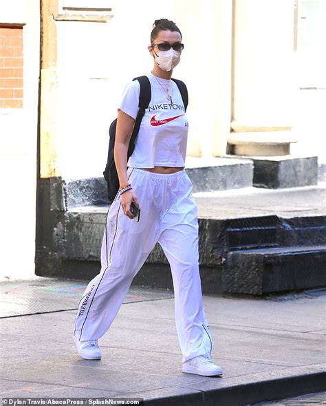 Bella Hadid Flashes Her Abs In Midriff Baring T Shirt And Tracksuit Bottoms In New York Daily