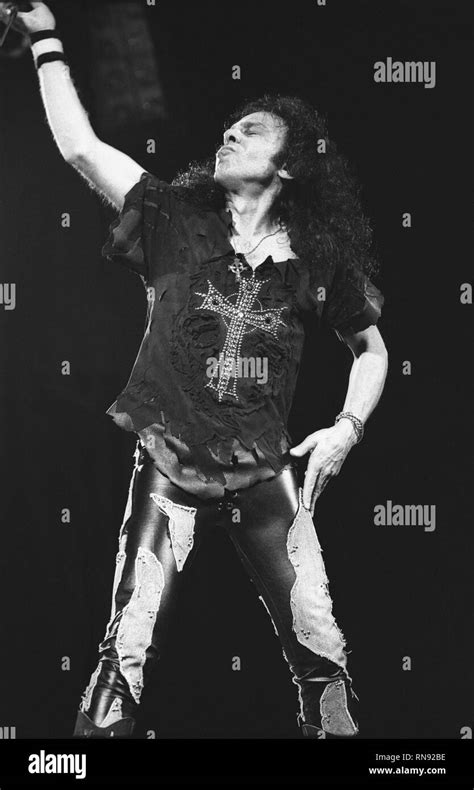 Singer Ronnie James Dio Is Shown Performing On Stage During A Live