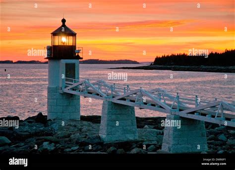 Sunset Over Marshall Point Lighthouse In Port Clyde Maine Stock Photo