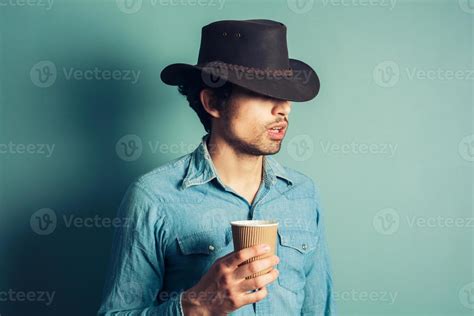 Cowboy Drinking Coffee 936815 Stock Photo At Vecteezy