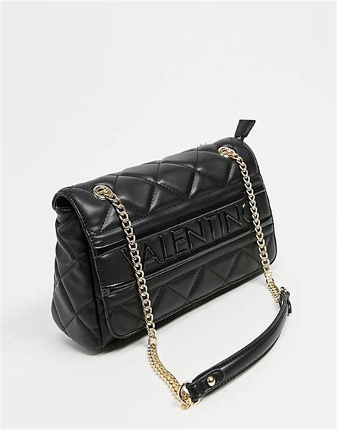 valentino bags ada quilted embossed cross body bag with chain strap in black asos