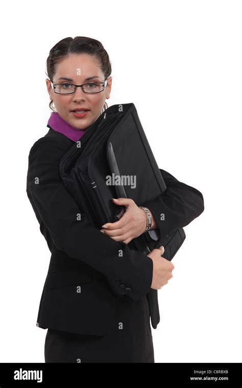Portrait Of Pretty Bespectacled Businesswoman Holding Briefcase Stock