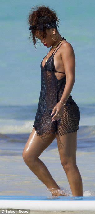 Rihanna Bares Her Body In A G String Bikini While Sunbathing On A