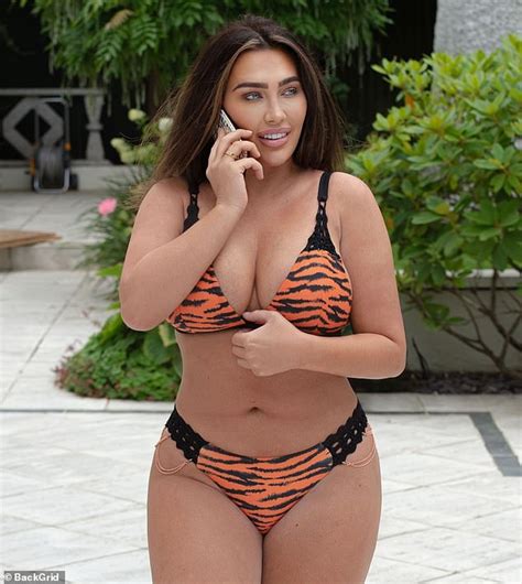 Lauren Goodger Showcases Her Voluptuous Curves In A TINY Tiger Print