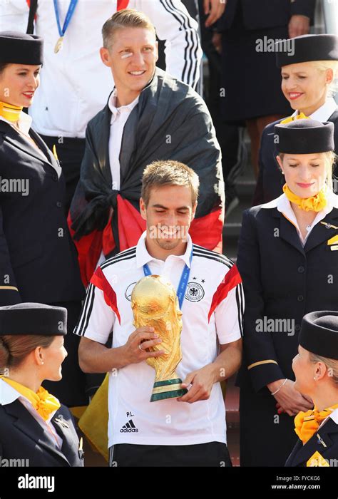 Philipp Lahm With The Trophy And Bastian Schweinsteiger Arrival Of The