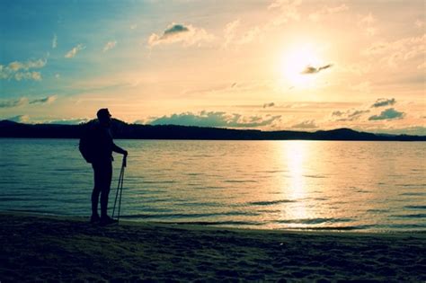 Stock Photo Man Watching The Sunrise By The Sea Free Download