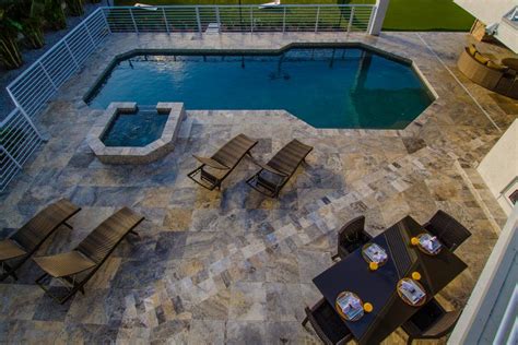 Contemporary Tile Patio Features Sleek Swimming Pool Hgtv