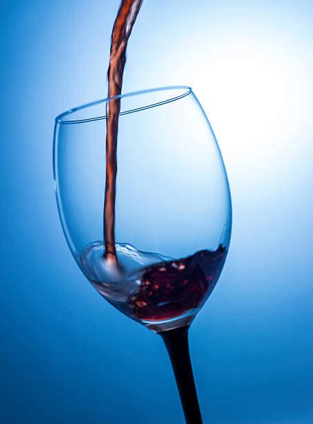 Wine Glass Blue Background Stock Photos Pictures And Royalty Free Images