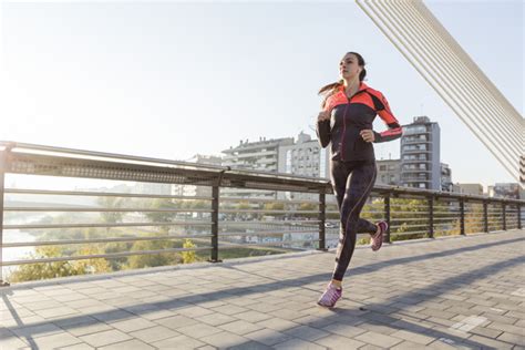 Young Woman Running Outdoors Photo Free Download