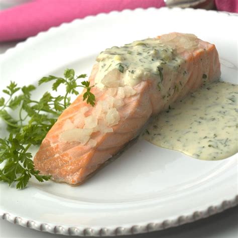 Place the salmon fillets on top of the herbs and lemon then cover with foil or parchment paper. Oven-Poached Salmon Fillets Recipe - EatingWell