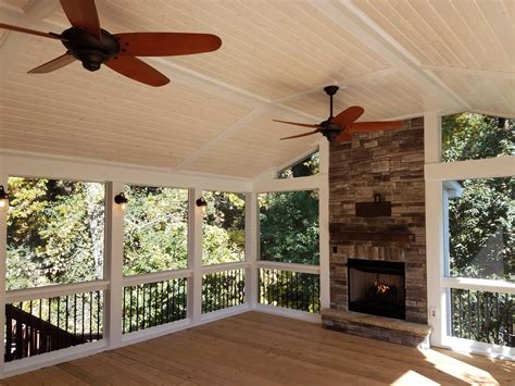 Screened Porch With Fireplace And Wall Sconces Deckscapes