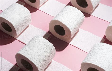 Toilet Paper Rolls On Pink Background By Stocksy Contributor