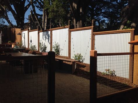 To create a truly unique fence design with lasting durability… more homeowners are using metal fence posts and frame kits. Inlayed corrugated steel fence | Yelp