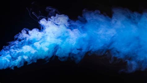 Premium Photo Dense Fumes Of Abstract Blue Smoke On Dark Background