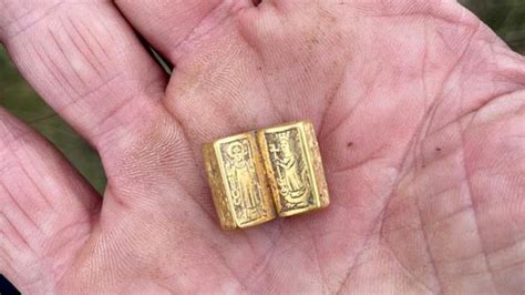 Metal Detectorist Finds Small Gold Bible Near York Bbc News