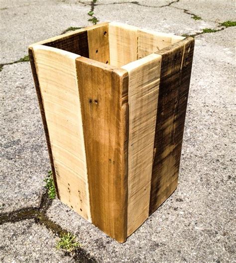 Place the strap over your car's shifter with the bag on the passenger side and you are ready to go. DIY Pallet Trash Bin | Pallet Furniture Plans