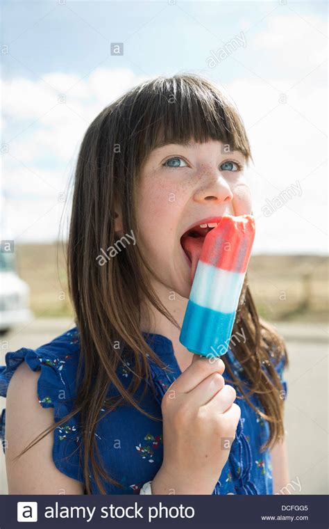 Little Girl Eating Popsicle Photo Stock Alamy