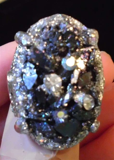 Also would appreciate any help with age and value. SOLD Rainbow hematite, rhinestone and aurora borealis ring ...