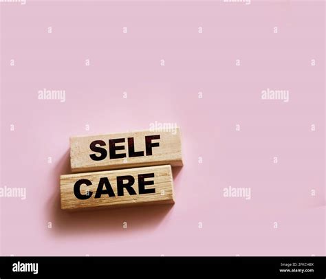 Self Care Words Printed On Wooden Blocks Self Treatment Concept Pink