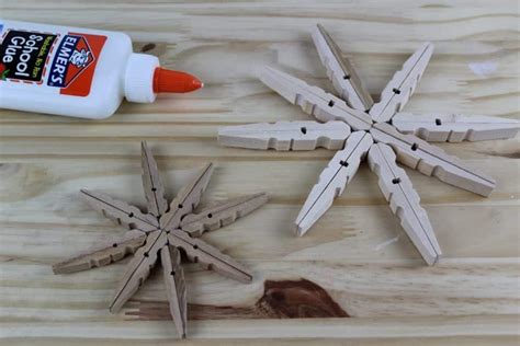 This Clothespin Glitter Snowflake Ornaments Is A Fun Holiday Craft For