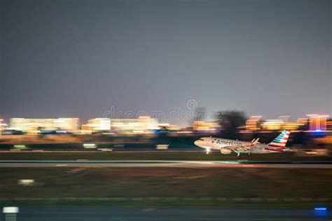 American Airlines Airplane Landing At Miami International Airport Night