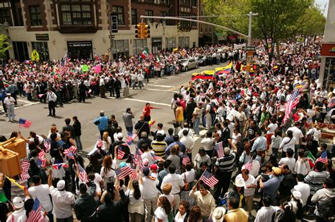 immigrants take to u s streets in show of strength the new york times