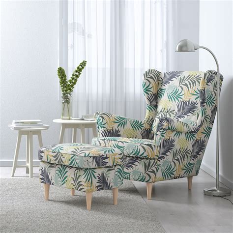 You may need to add a rectangular soft lumber support pillow. STRANDMON Wing chair - Gillhov multicolour - IKEA