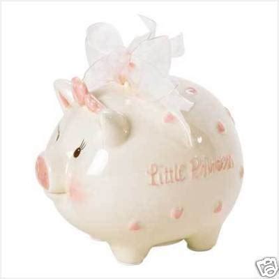 You can even deck out your little blossom's room with little sprout decorative accents like frames, tea sets and play toys. MAREESHOMEDECORANDMORE : Mud Pie Princess Piggy Bank