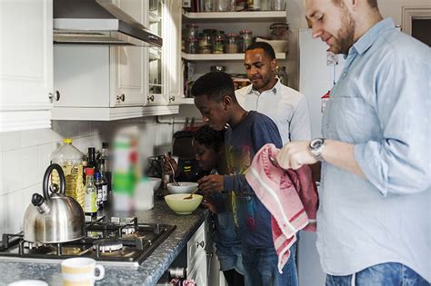 Same Sex Couple With Son And Daughter In The Kitchen First4adoption