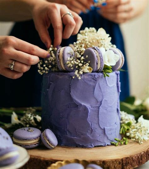 Beautiful Lavender Cake Decorated With Matching Macarons And Fresh White