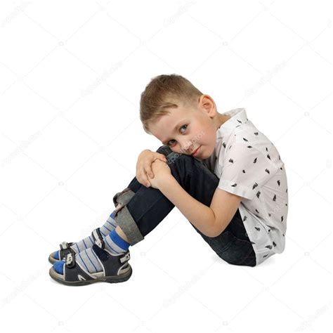 Sad Little Boy Sits On Floor Hugging His Knees — Stock Photo