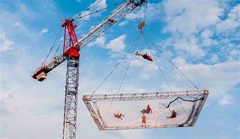 Daredevils Doing Flips On ‘worlds Largest Trampoline Suspended From