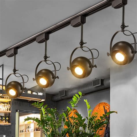 It can be suspended or flush mounted to mold to the difficult ceiling shape, and the easy adjustability high ceilings create shadows and vaulted ceilings often have exposed beams that can add to that. Modern Track light LED Ceiling Rail LampTrack lighting ...