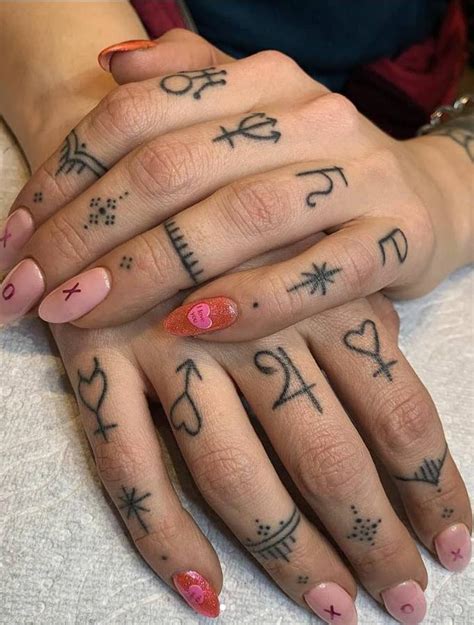 unique finger tattoos