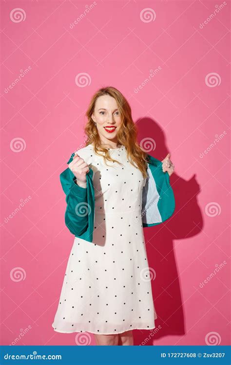 Beautiful Fashionable Young Blonde Woman Posing In A Studio Wide