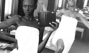 Ajak Deng Slays In A Series Of Fierce And Dramatic Bathroom Selfies