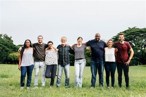 Premium Photo Happy Diverse People Hugging Each Other In The Park