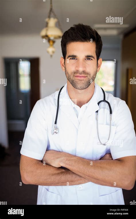 Smiling Nurse With Arms Crossed Stock Photo Alamy