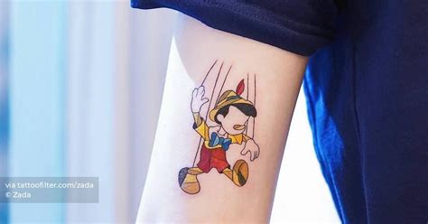 Pinocchio Tattoo On The Tricep