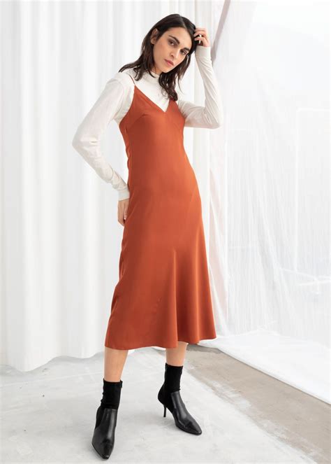 Model Front Image Of Stories Midi Slip Dress In Orange Slip Dress Womens Dress Suits Boho