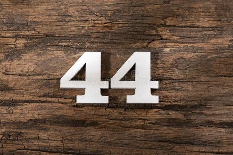 Forty Four 44 White Wooden Number On Rustic Background Stock Photo