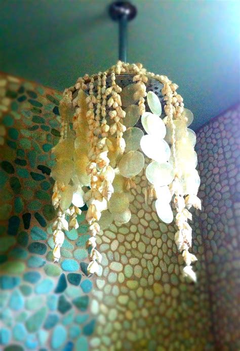 Hang Strands Of Shells And Capezios From Rainfall Shower Head Decor