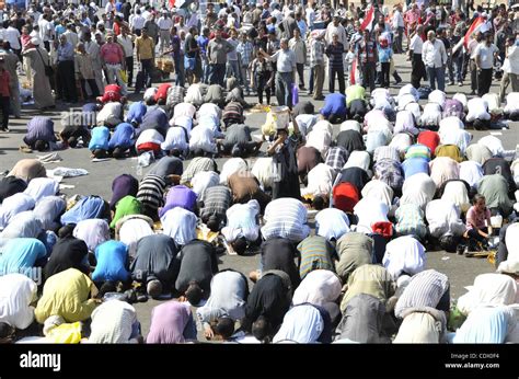 egyptian demonstrators attend friday prayers during a weekly protest in tahrir square cairo