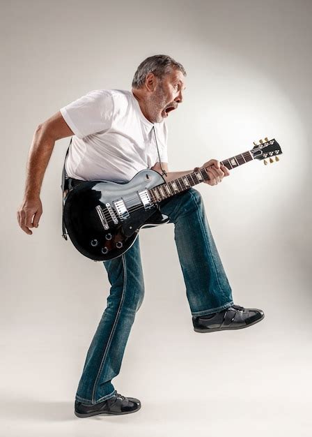 Free Photo Portrait Of A Guitar Player