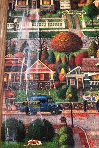 Don't panic when you apply the mod podge — it leaves a white film when wet, but dries clear. mod-podge-glue-puzzle-jigsaw - momhomeguide.com