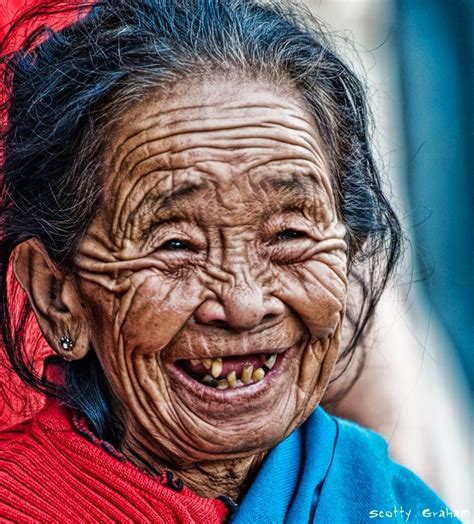 a face and smile to remember i was walking down a street in kathmandu and i saw this lady
