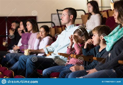 People Enjoying Film Screening In Cinema Stock Photo Image Of